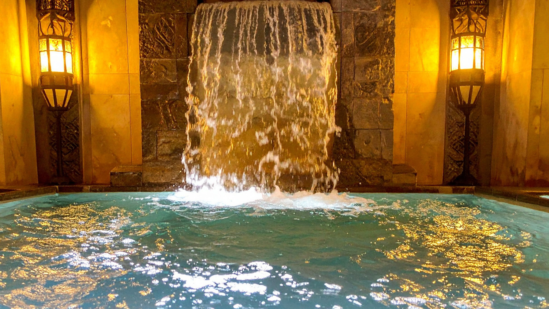 Featured image for “Resort-Style Features: Upgrading Your Pool with Waterfalls, Sun Shelves, and Lighting”