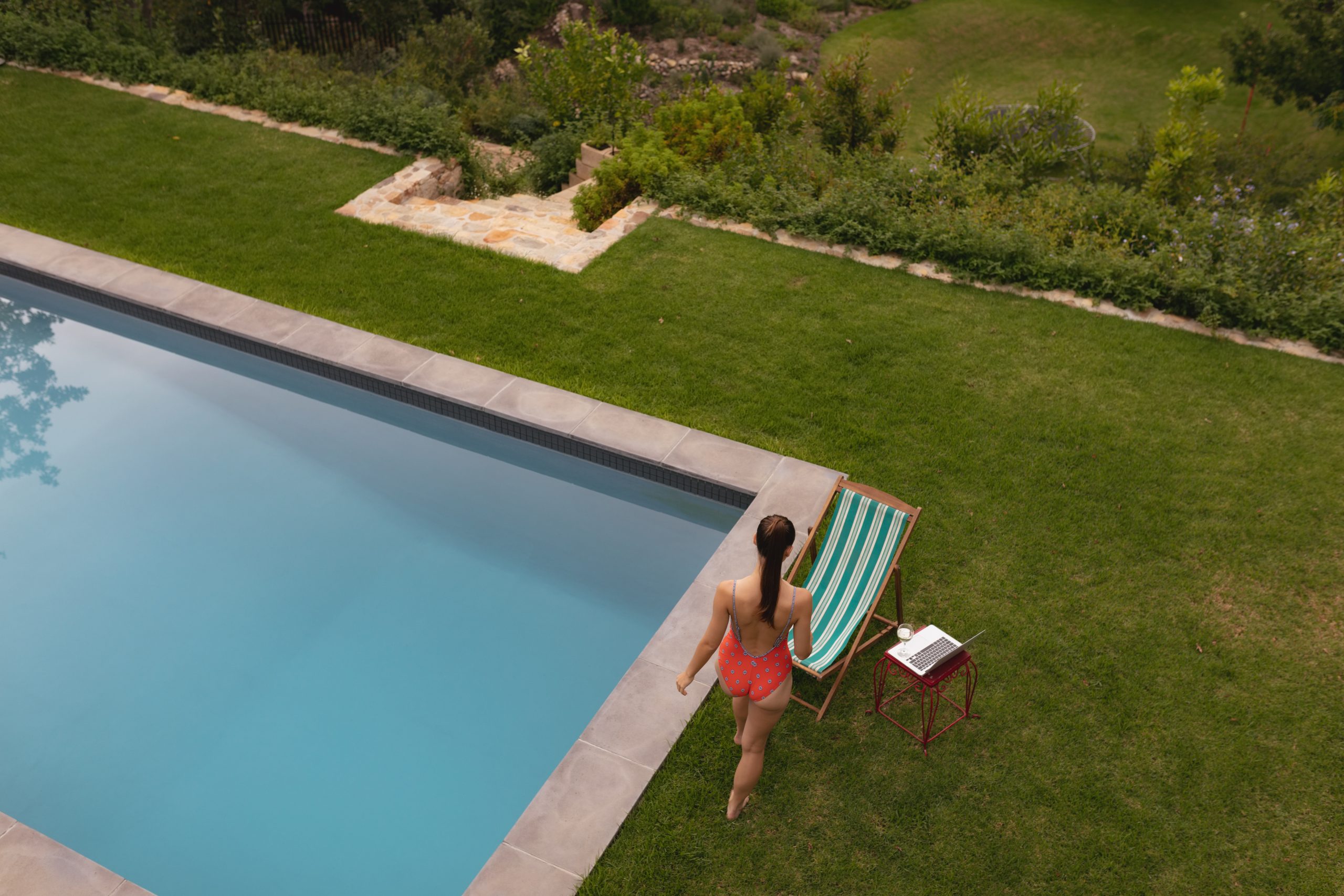 Featured image for “Custom Pool Waterfalls: Design Ideas That Increase Backyard Value”